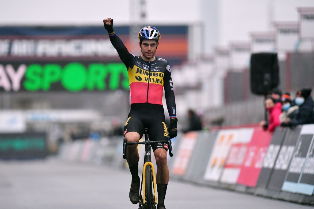 ZOLDER BELGIUM DECEMBER 27 Wout Van Aert of Belgium and Team JumboVisma celebrates winning during 17th Superprestige HeusdenZolder 2021 Mens Elite SuperprestigeCX SPHeusdenZolder on December 27 2021 in Zolder Belgium Photo by Luc ClaessenGetty Images