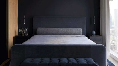 a dark purple minimalist bedroom
