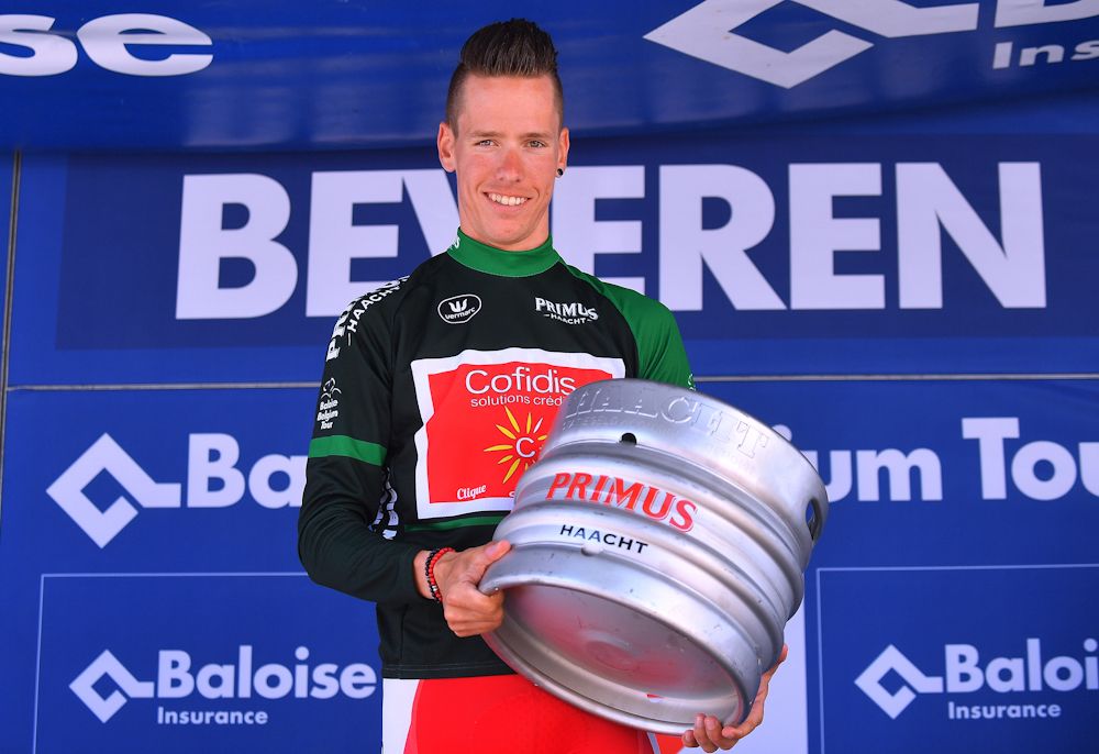 Kenneth Van Bilsen in the black jersey after stage 3 at the Belgium Tour