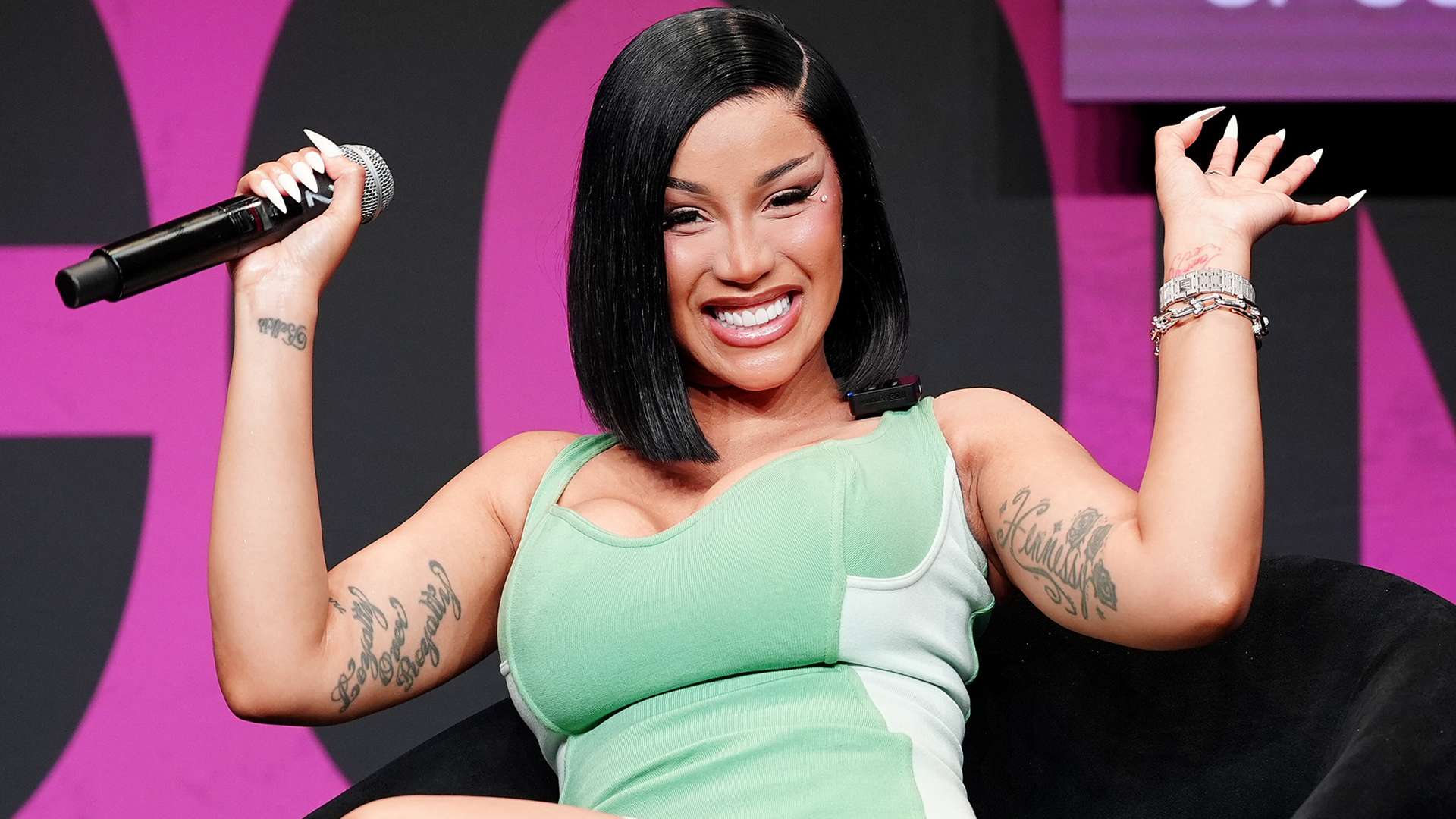 Cardi B wore the peep-toe boots trend while filming her music video in NYC