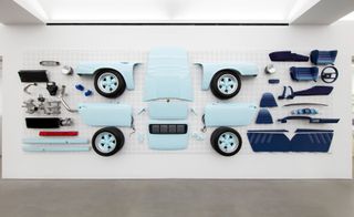 Car parts on wall, part of Daniel Arsham 20 Years exhibition at Perrotin
