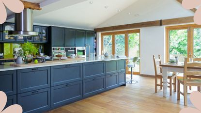 Navy blue kitchen with dining area overlooking a backyard to support a step-by-step guide for how to cleaning a kitchen in under an hour