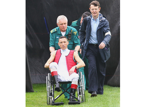 Frankie Dettori in a wheelchair after his fall from Eland Ally at Nottingham. 2/10/2013 Pic Steve Davies/Racingfotos.com