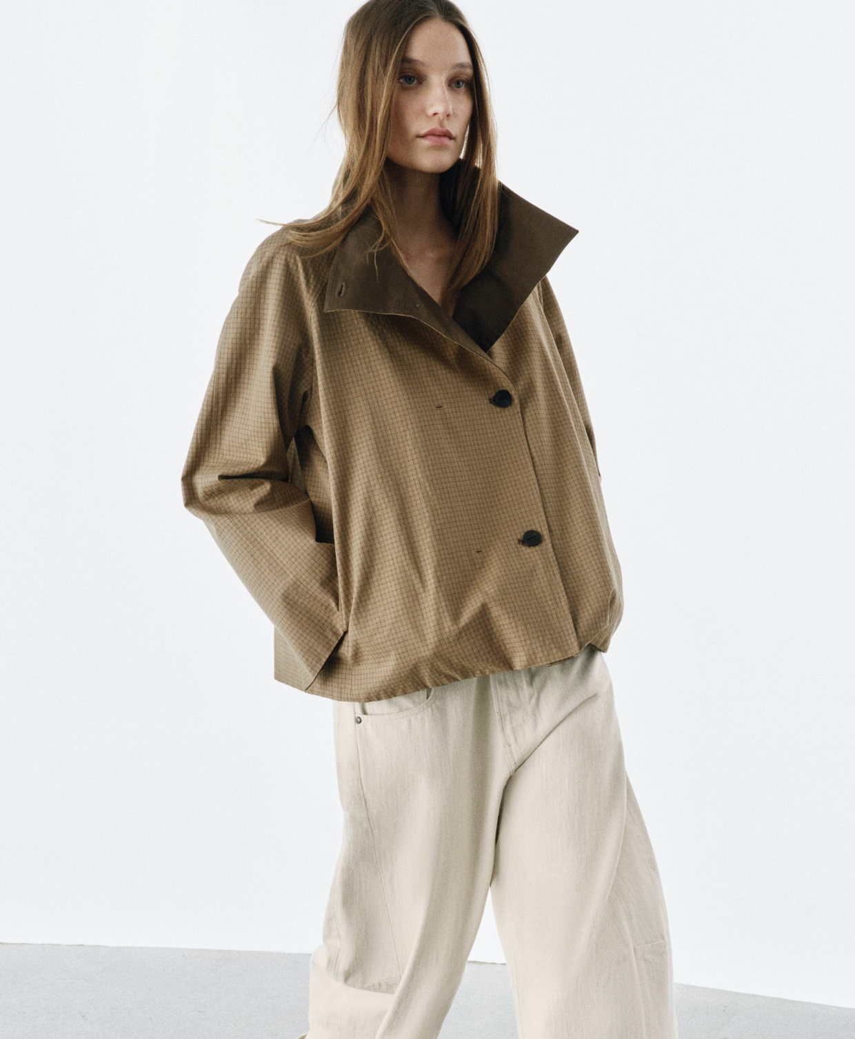 Model wears the Zara Reversible Check Jacket from the zw Collection. This coat is part of the Zara, Marks and Spencers and H&amp;amp;M trending jacket round up.