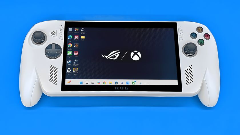 Xbox Ally on its back with the default Windows background showing the ASUS ROG logo and the Xbox logo.