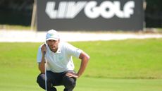 Sebastian Munoz lines up a putt at the 2023 LIV Golf Mayakoba event