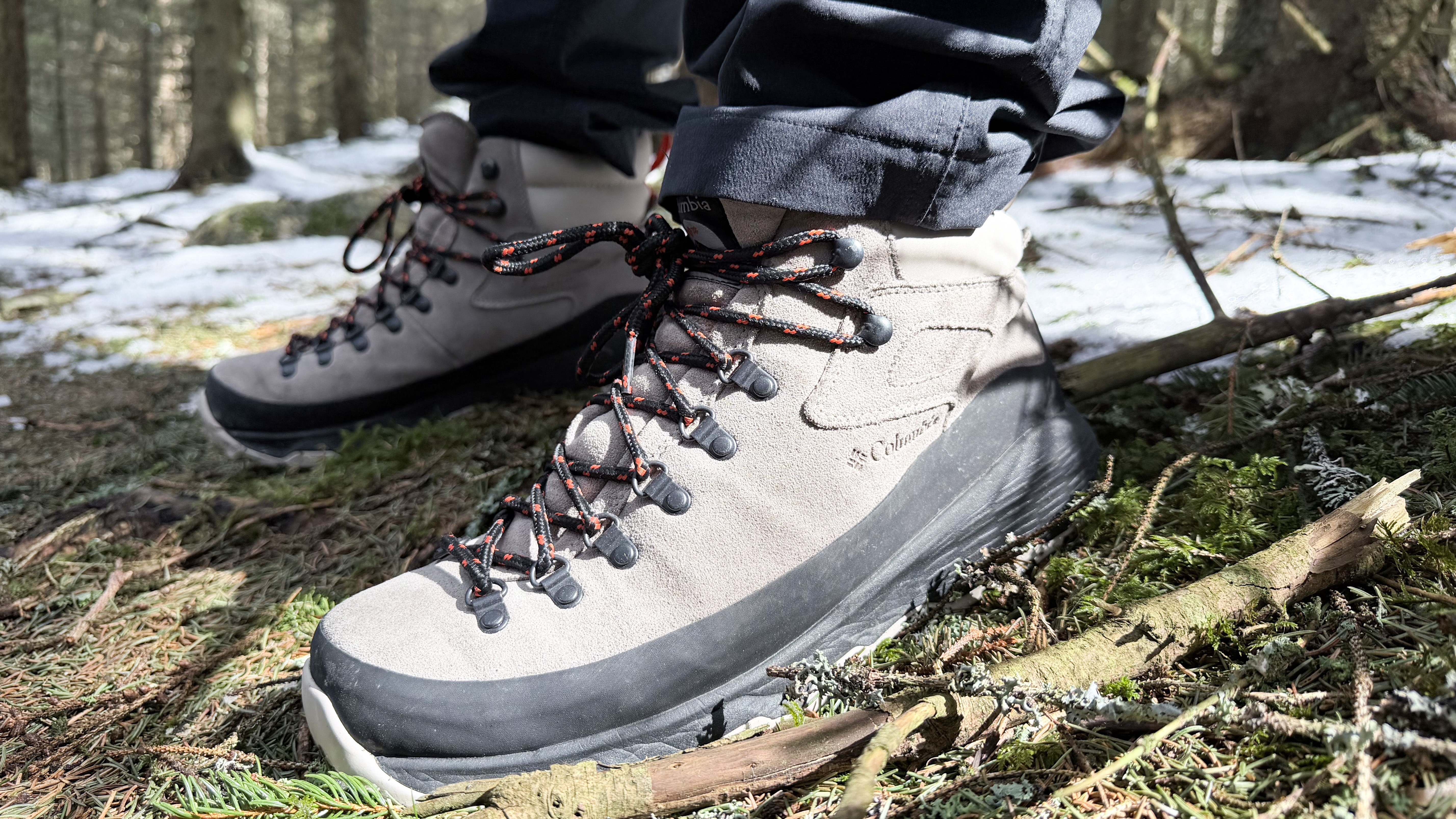 The Columbia Newton Alpine boots being worn in woodland