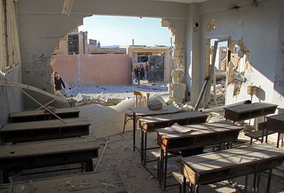 A damaged classroom in Haas, Syria.