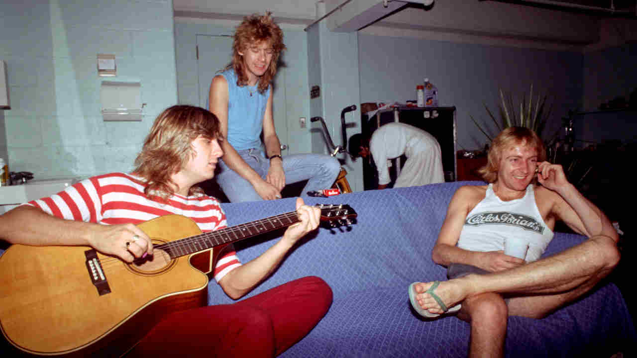 Def Leppard posing for a photograph backstage in the 1980s