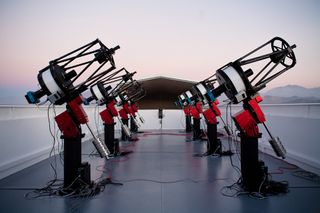 The MEarth South telescope array at the Cerro Tololo Inter-American Observatory in Chile. Each telescope monitors its own set of nearby red dwarfs for exoplanet transits.