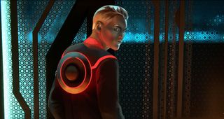 A character from Tron: identity glowers over his shoulder