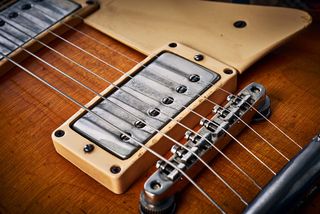 Adjust the pickup height up for a hotter sound and down for cleaner tones.