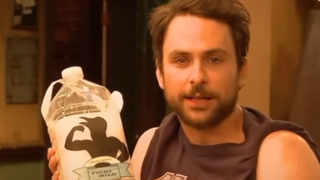 Charlie Day holds up a can of Fight Milk.