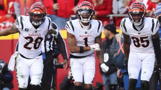 a'Marr Chase #1 of the Cincinnati Bengals celebrates scoring a touchdown with teammates