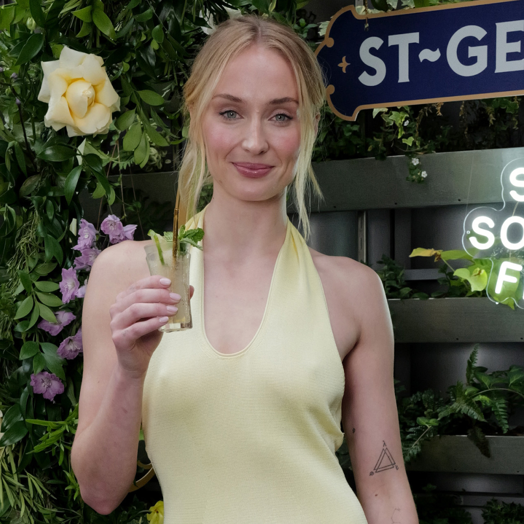 Sophie Turner styles a chic yellow sun dress in NYC.
