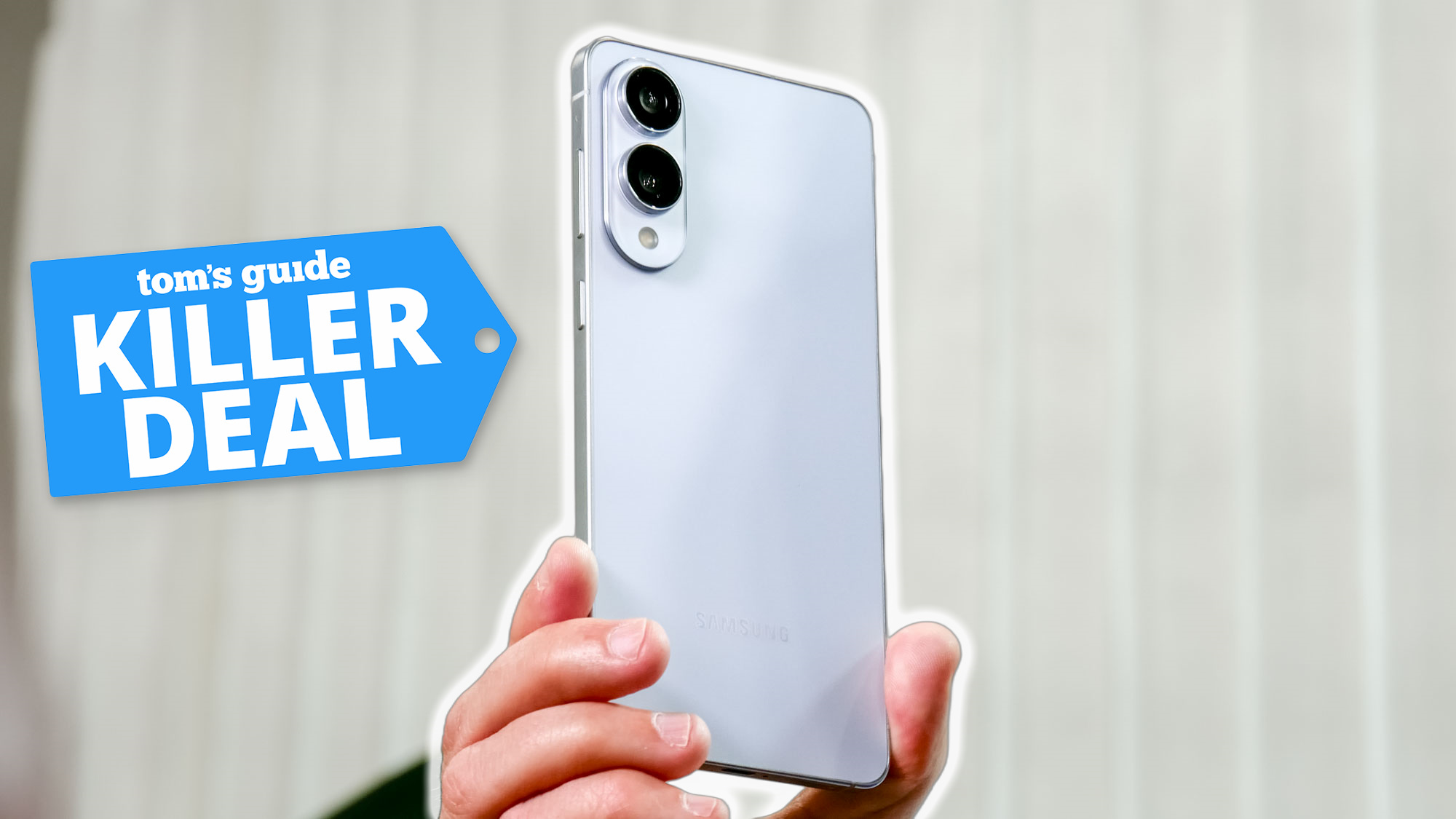 Galaxy S25 Edge held in the hand with killer deal badge nearby.