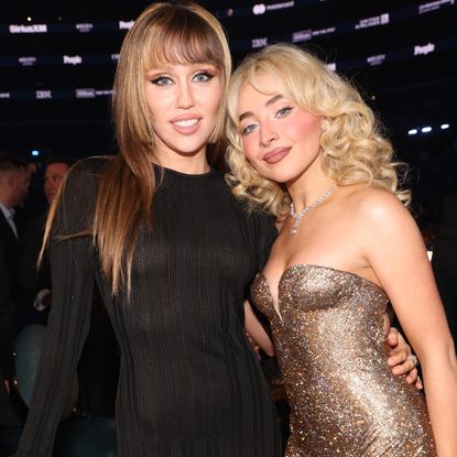 Miley Cyrus and Sabrina Carpenter attending the 2025 Grammy awards