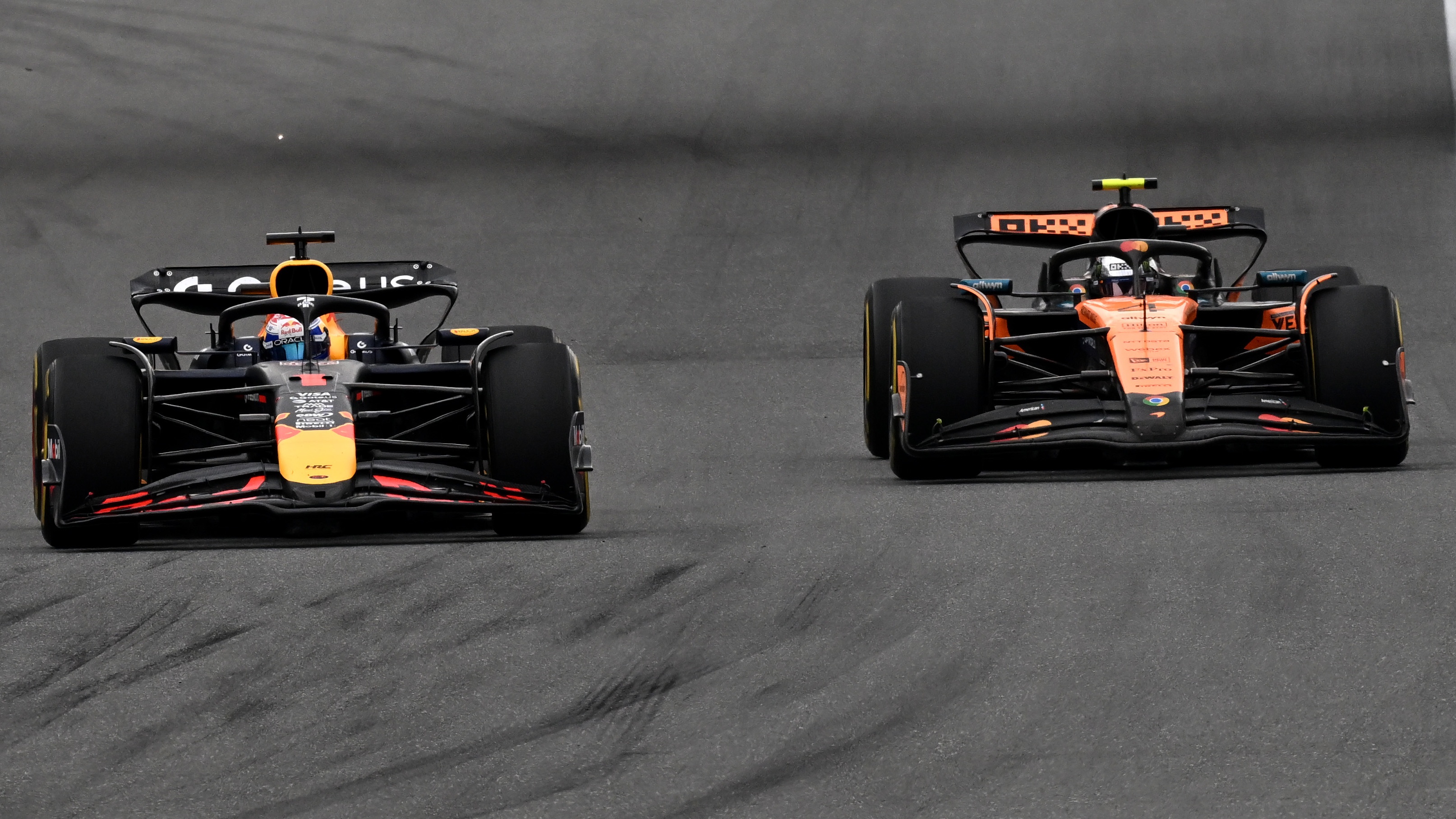 Lando Norris and Max Verstappen battle for second place in the Miami GP.