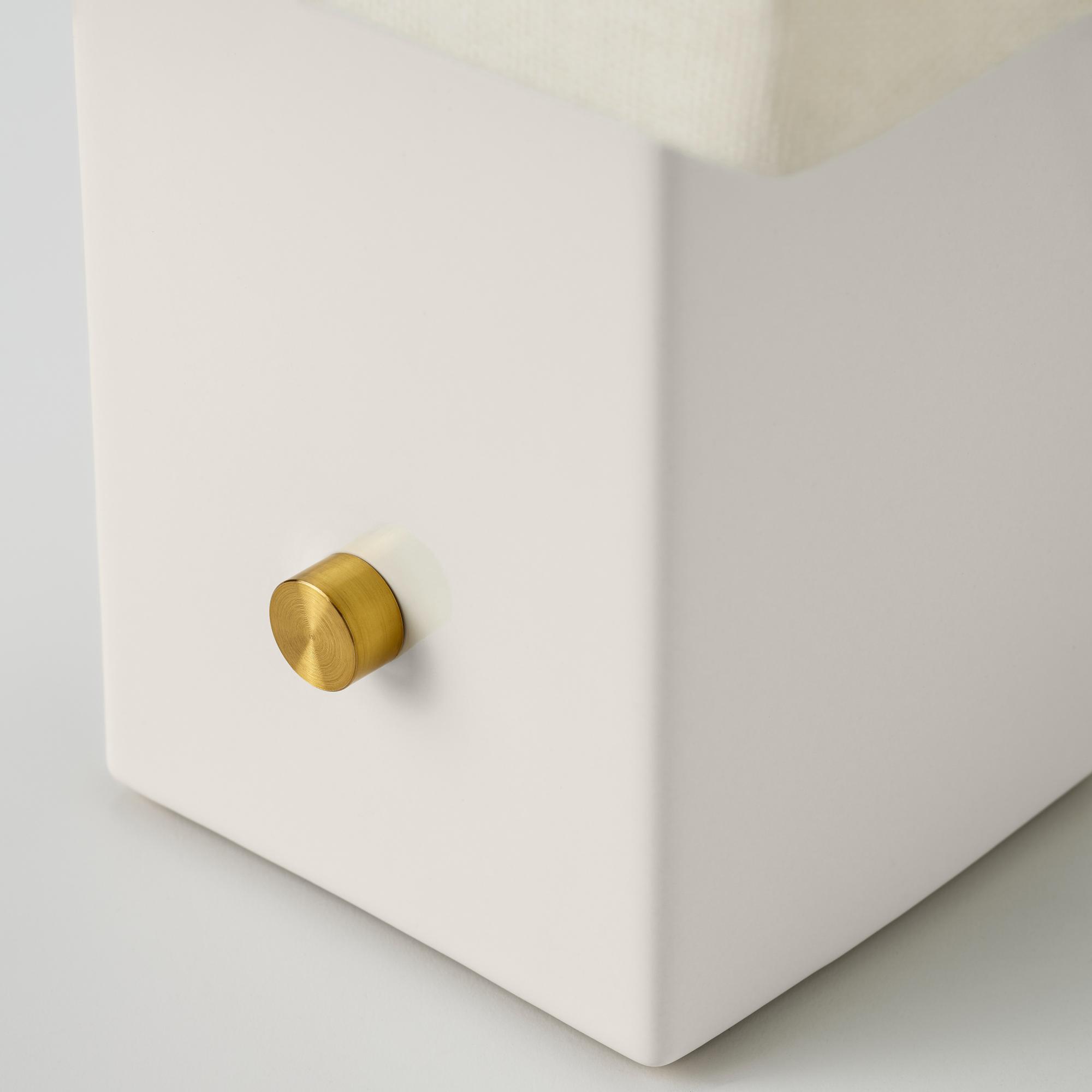 close up of brass lamp dimmer switch
