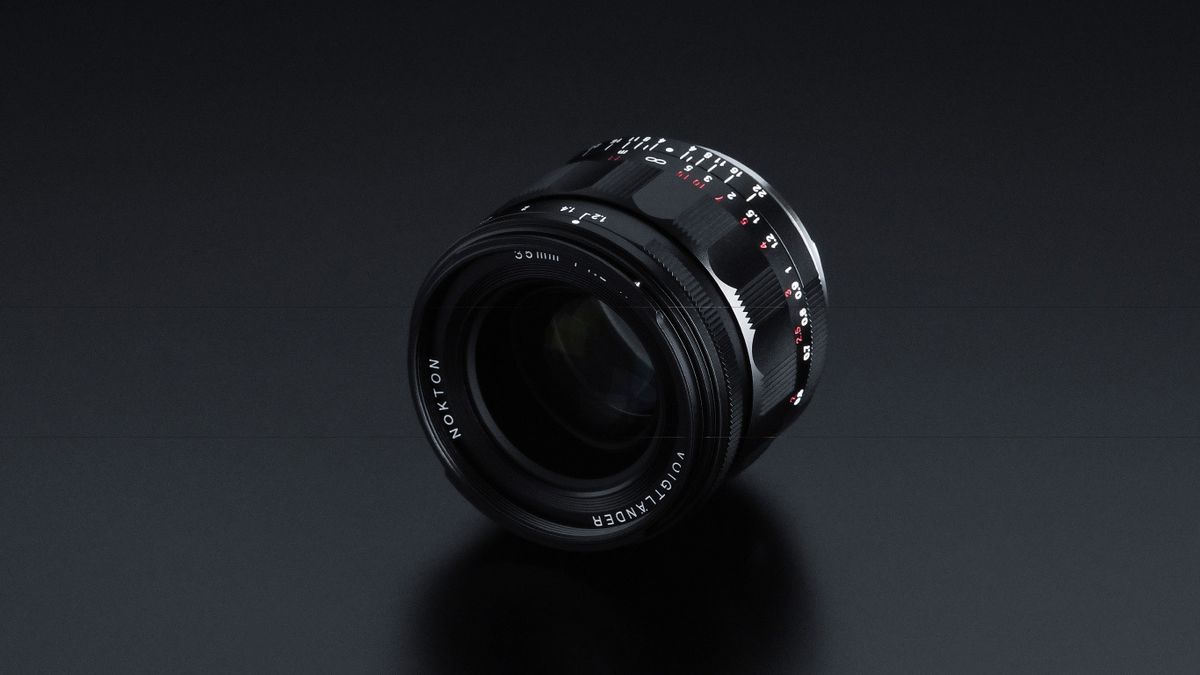Close-up of NOKTON 35mm F1.2 Aspherical IV lens, showcasing its detailed markings on a smooth black surface