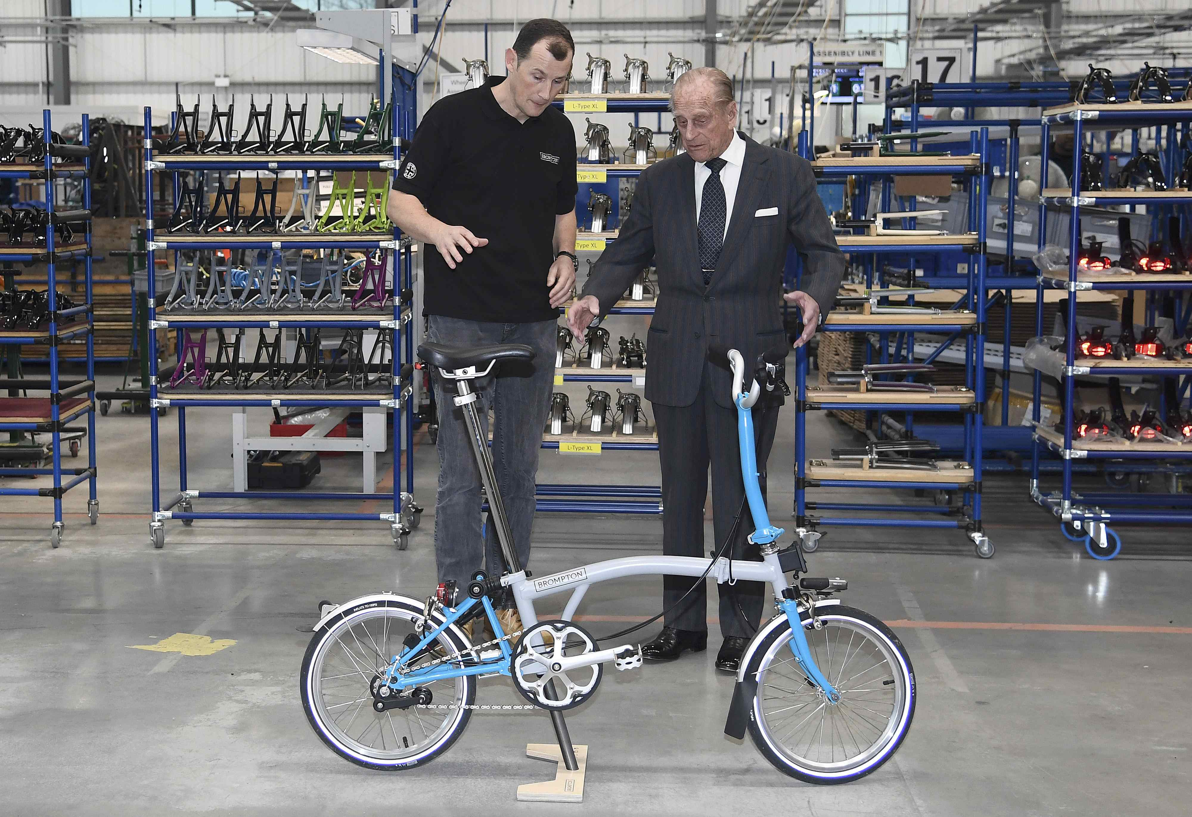 Prince Philip and CEO Will with a Brompton bike