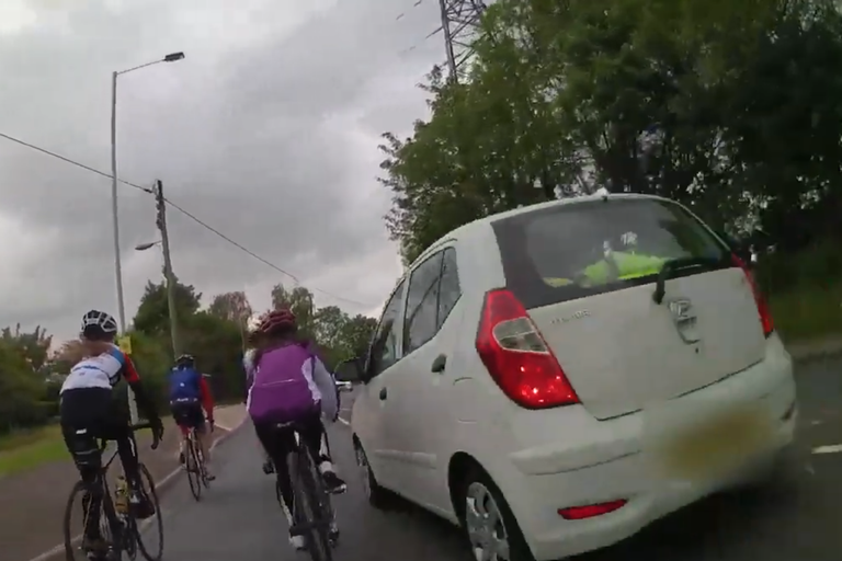 The moment a driver made a dangerous overtaking manoeuvre on a group of cyclists 