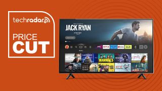 Amazon Fire TV 4 Series with sign saying price cut