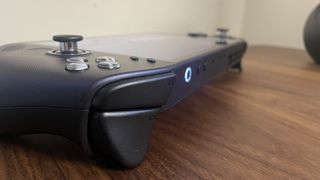 A Lenovo Legion Go S handheld with SteamOS in Nebula Nocturne colour scheme