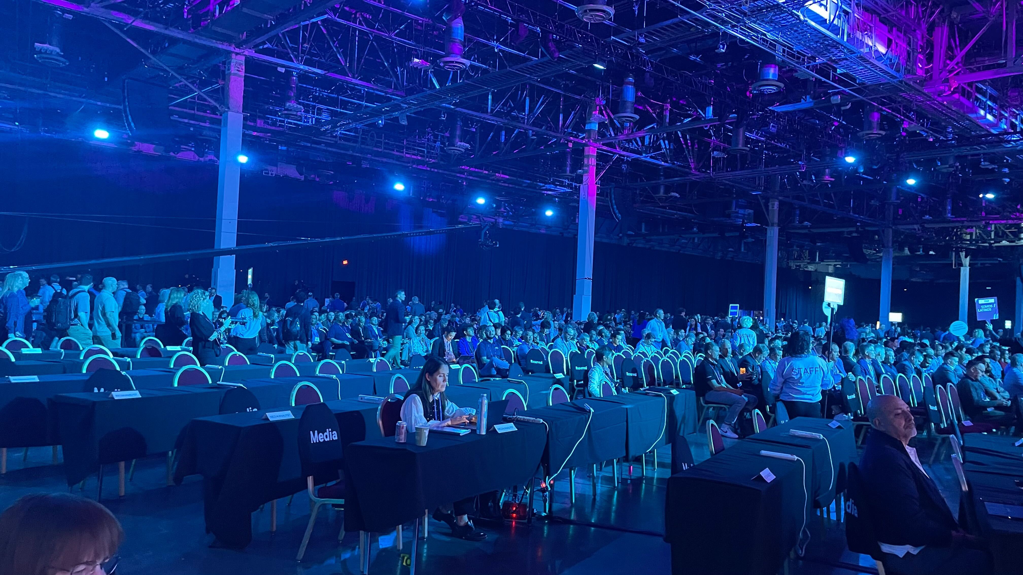 Delegates coming into the Venetian Conference & Expo Center auditorium