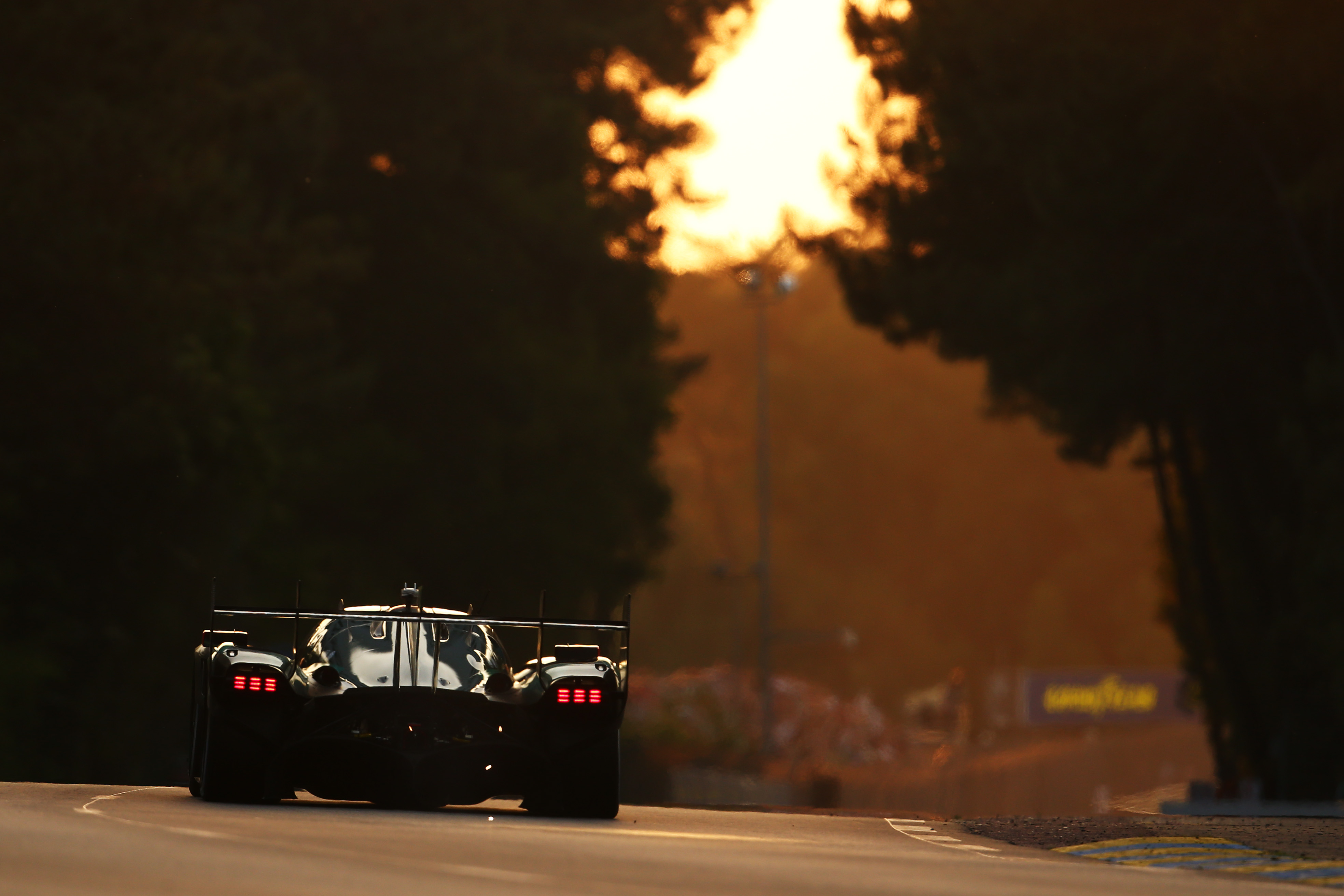 Aston Martin Valkyrie racing off into the sunset at Le Mans 2025