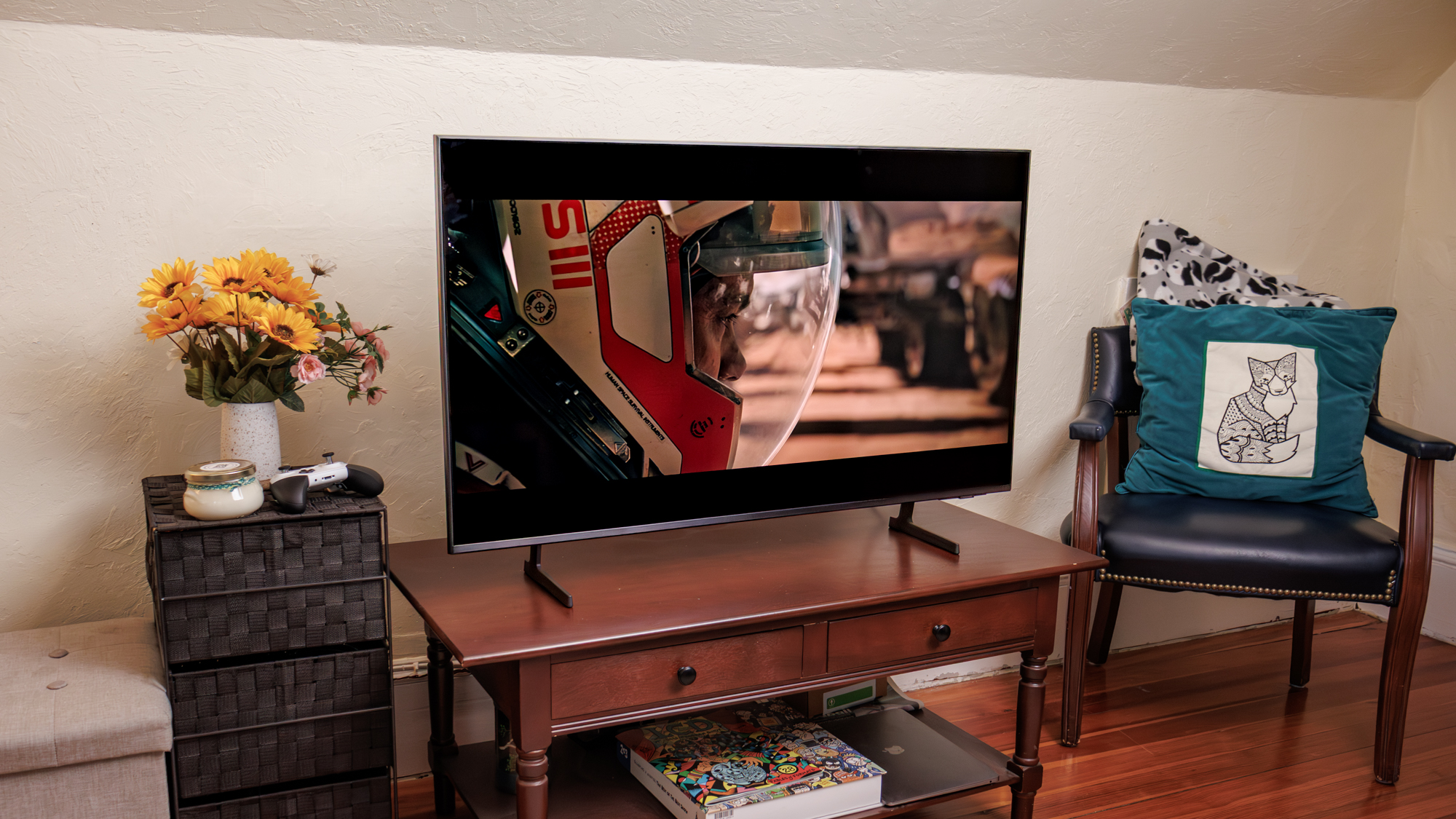 Samsung Q7F QLED TV on a side table