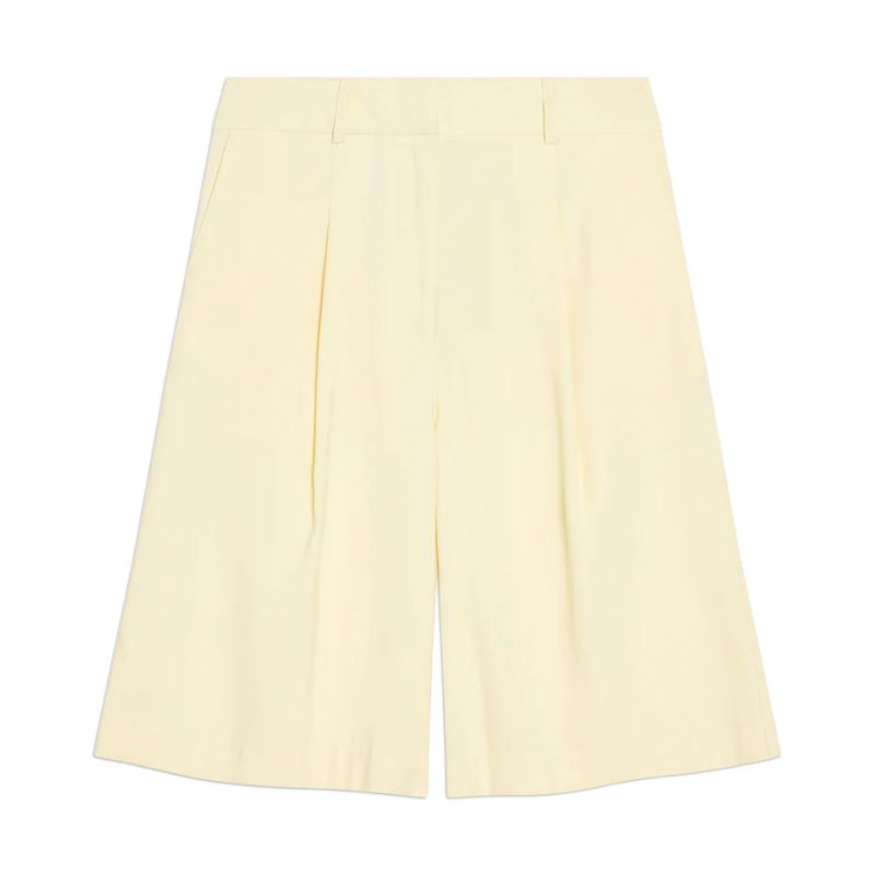 A cutout of butter yellow Bermuda shorts from Albaray