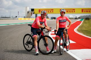 Elisa Longo Borghini and Mads Pedersen show off Pirelli's logo on the teams 2022 training kit