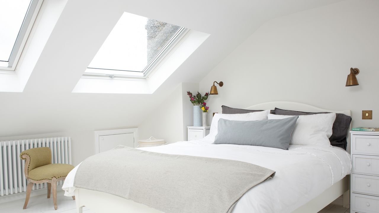 White loft bedroom with double bed