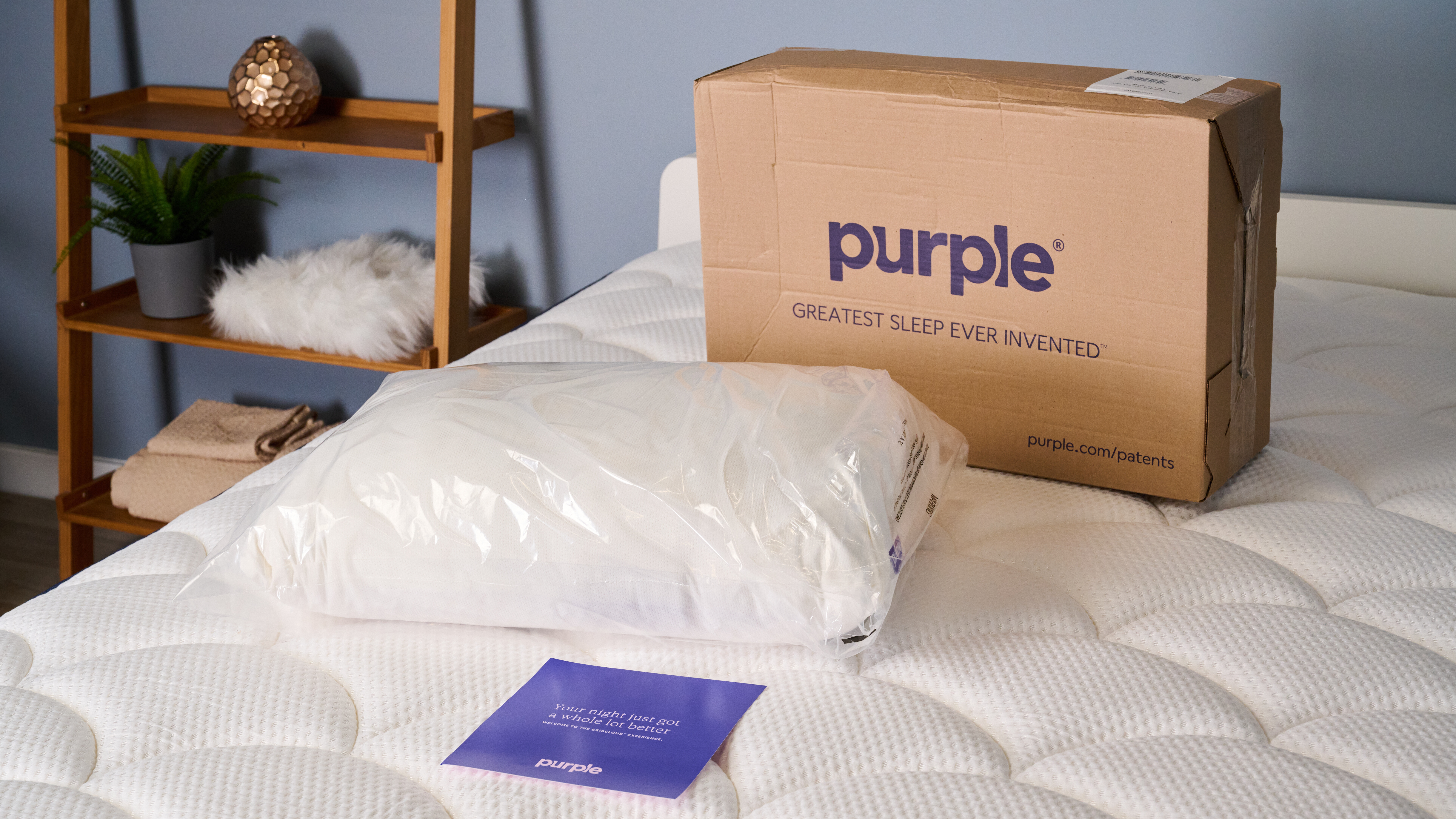 Purple GridCloud pillow in its packaging in TG Sleep Studio