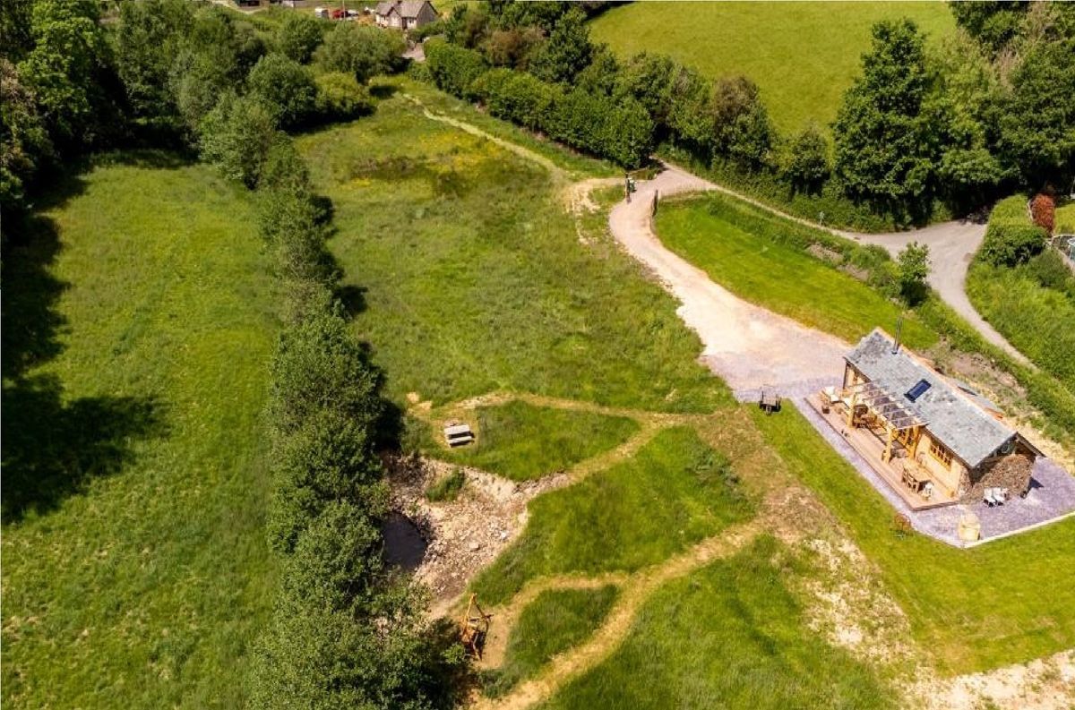 exterior aerial shot of timber cabin