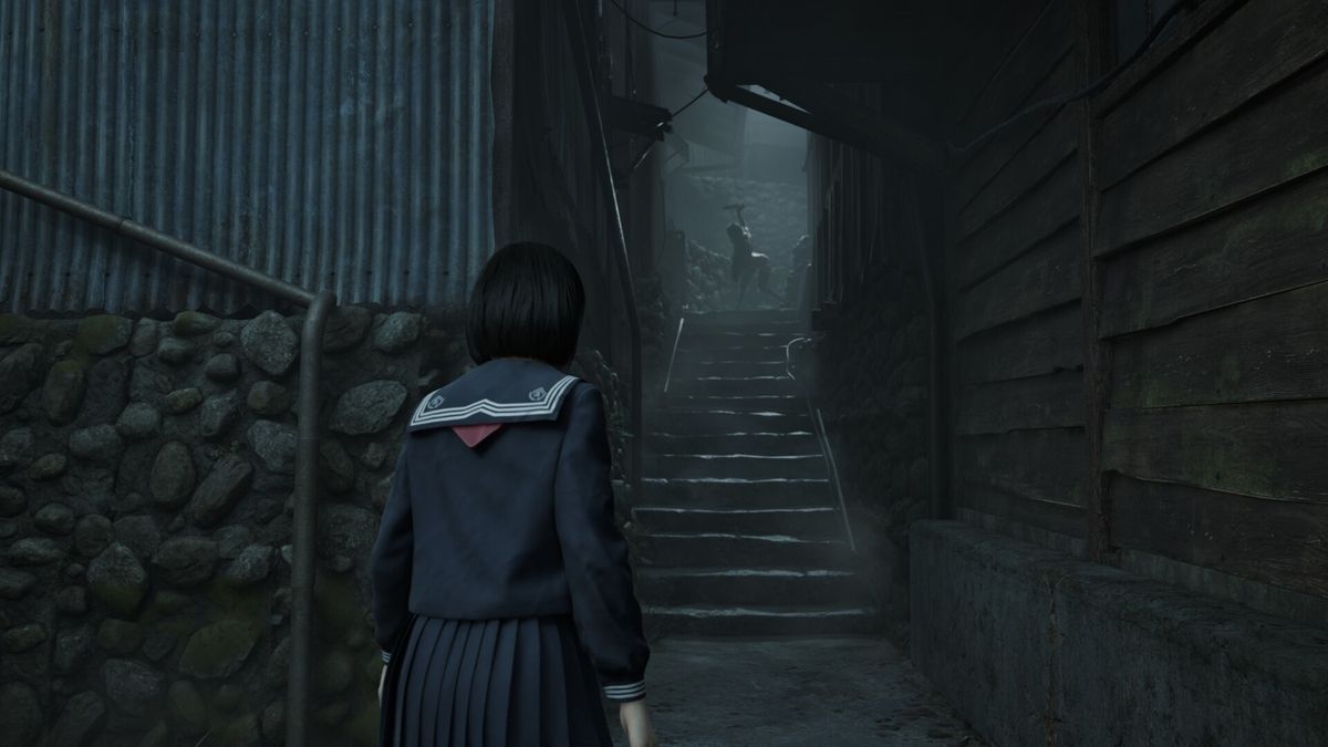 A girl looks at a monster in Silent Hill f