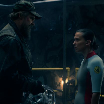 david harbour as hopper and millie bobby brown as eleven talking before she goes in the deprivation tank in the stranger things season 5 finale