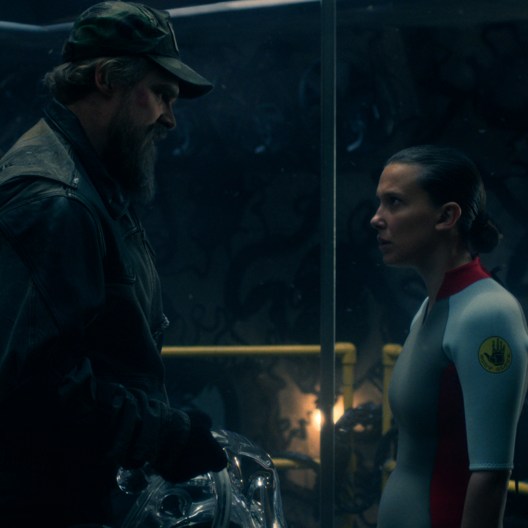 david harbour as hopper and millie bobby brown as eleven talking before she goes in the deprivation tank in the stranger things season 5 finale