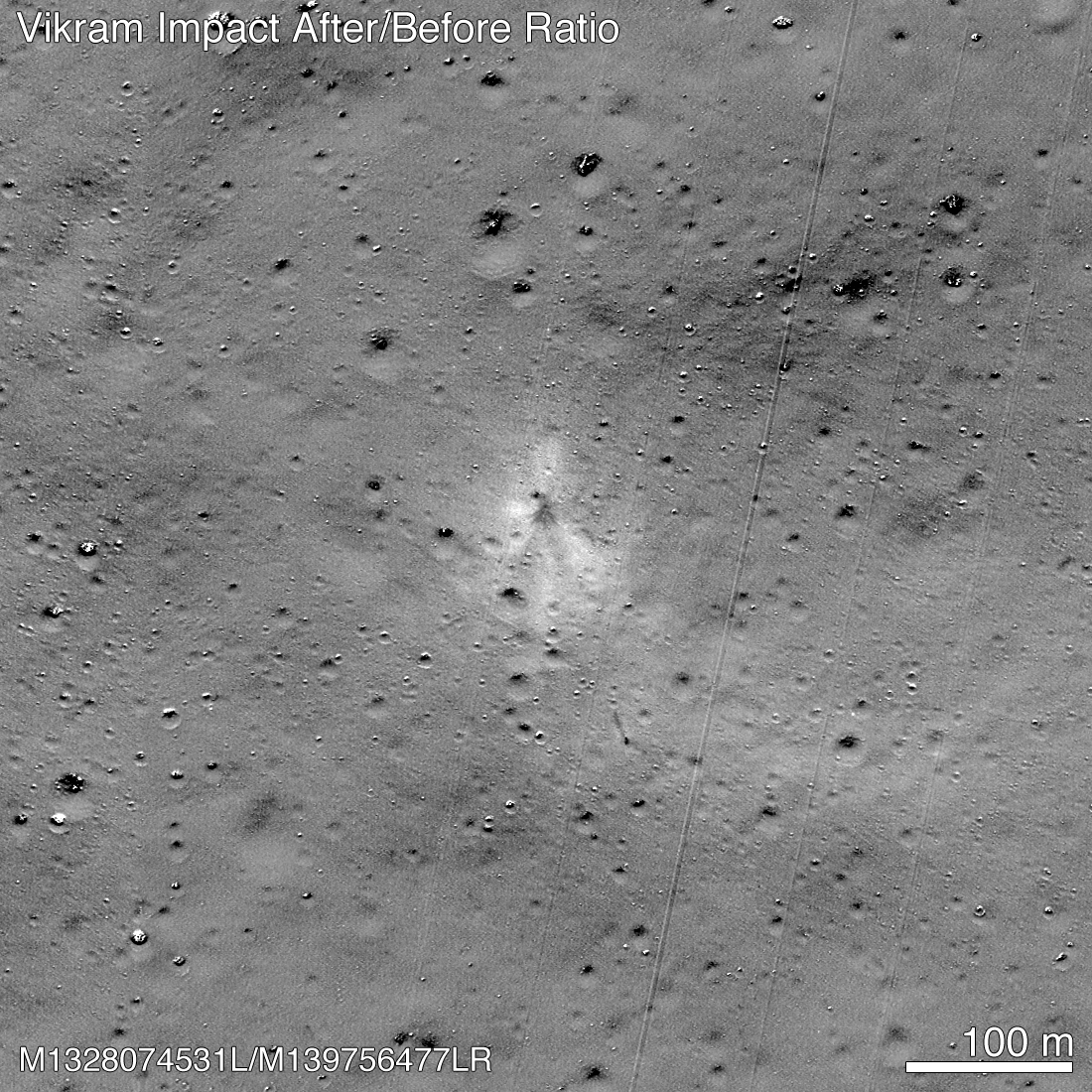 An image combining before and after photographs of the Vikram impact site highlights the dark inner and light outer materials splaying out from the impact. (The straight diagonal lines are imaging artifacts, not features on the moon.) 