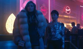 Hustlers Jennifer Lopez and Constance Wu scheming in the club