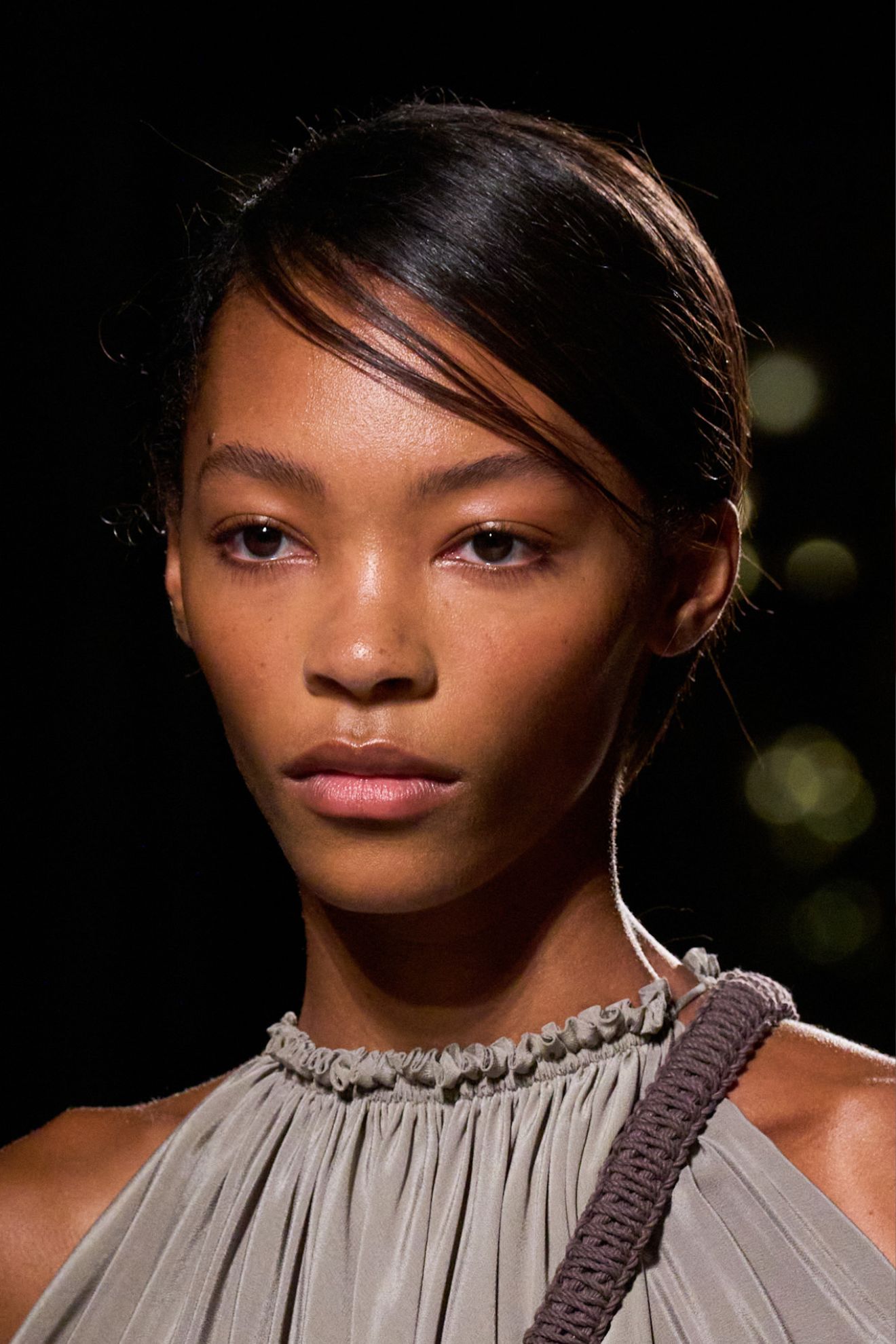A model with a side fringe at the Balmain SS26 show