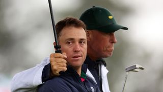 Justin Thomas and his caddie Jim Mackay on the 18th at Augusta National after missing the 2023 Masters cut