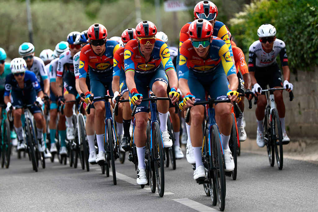Lidl-Trek's Danish rider Mads Pedersen (C) cycles with the pack of riders during the first stage of the 108th Giro d'Italia cycling race, 160km from Durres to Tirana in Albania, on May 9, 2025. (Photo by Luca Bettini / AFP)