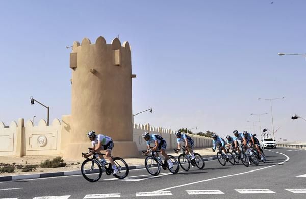 Omega Pharma-Quick Step riders round a corner in the 11.3km team time trial