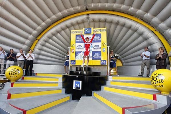 The Tour podium is quite large but the centre of attention is still clearly visible.
