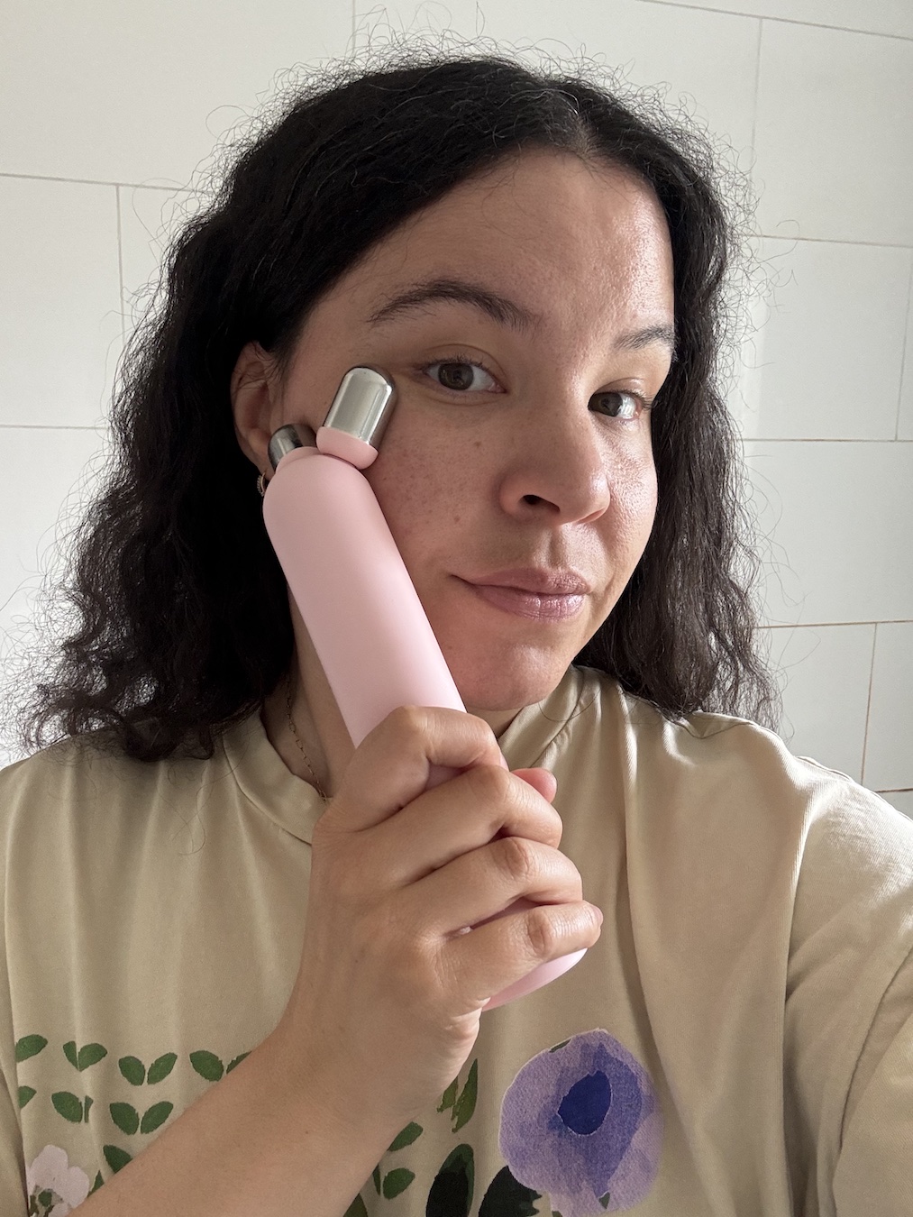 Mica Ricketts testing Medicube Mini Booster Pro Plus Face Roller Device Set