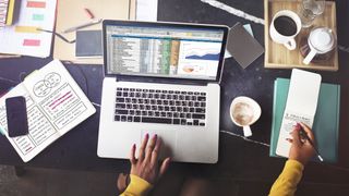 Woman working on spreadsheet