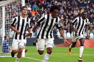 Juan Cuadrado of Juventus celebrates after scoring his team's second goal during the Serie A match between Juventus and Benevento Calcio on November 5, 2017 in Turin, Italy.
