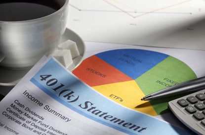 Close up of a 401(k) statement. The statement is surrounded by a cup of coffee, a pie chart of personal finances, a calculator and a pen with a soft focus on a graph in the background.This im